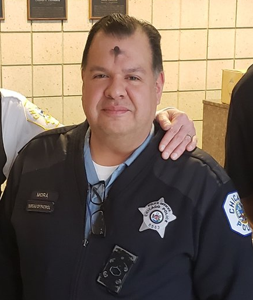 MARK M. MORA