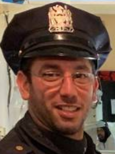 ADAM E. BLUM